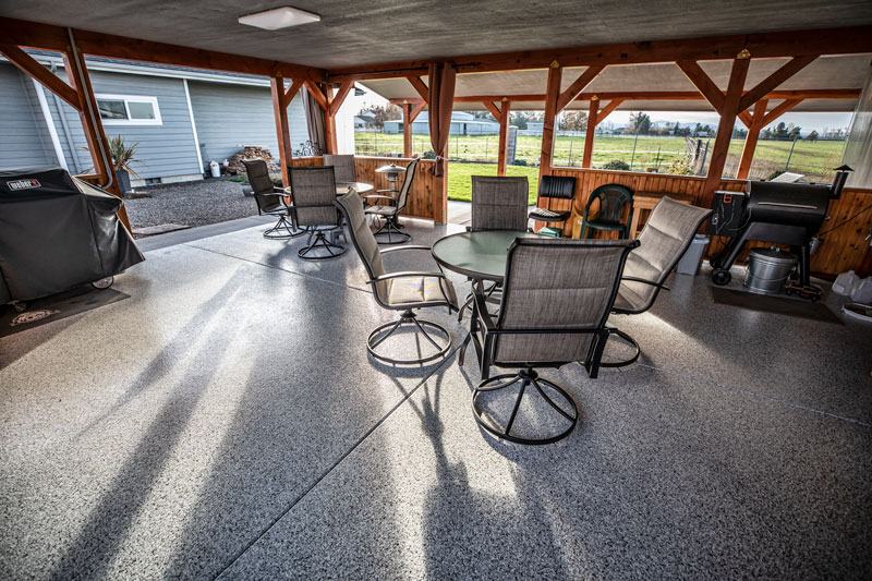 Flake coating on a covered patio and outdoor kitchen